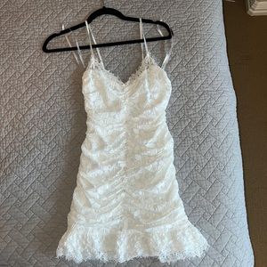 For love and lemons white dress. Bought for a photo opp only!